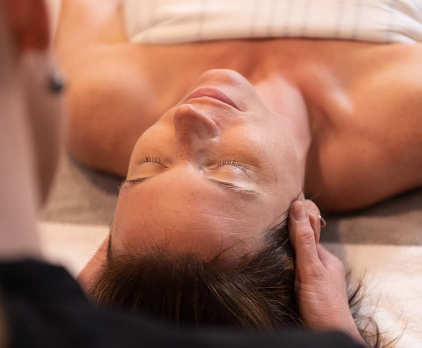 Woman getting massage at BHAV Spa