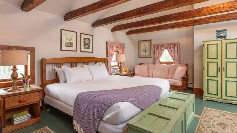 King Bed in Room 7 with wooden beams